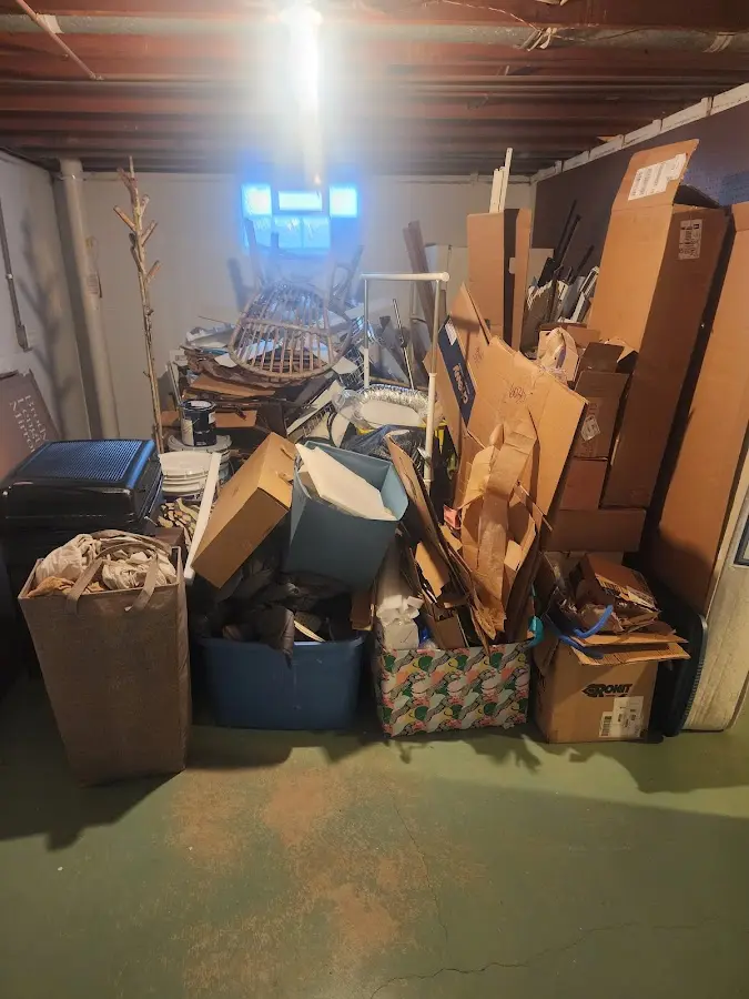 Roll-off dumpster container at job site for Cleanout Dumpster Rental in South Valley